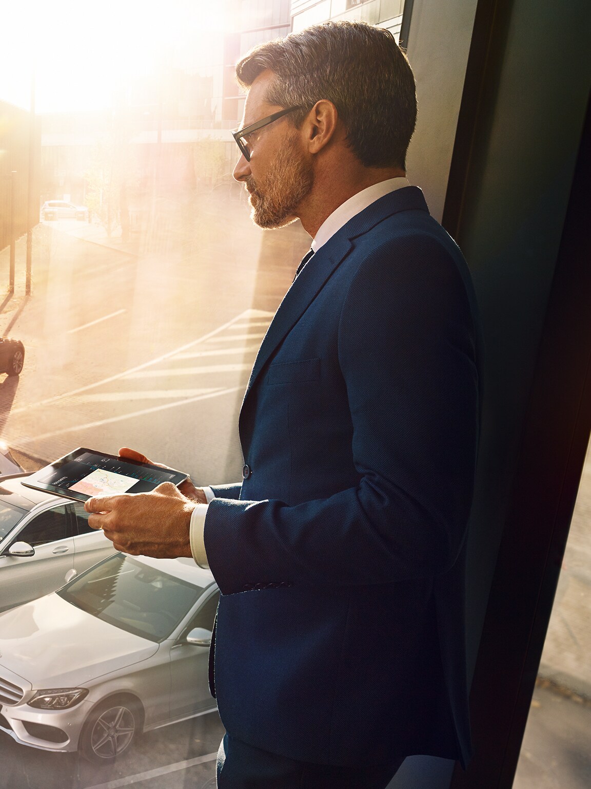 Picture shows customer is happy looking at the Mercedes-Benz