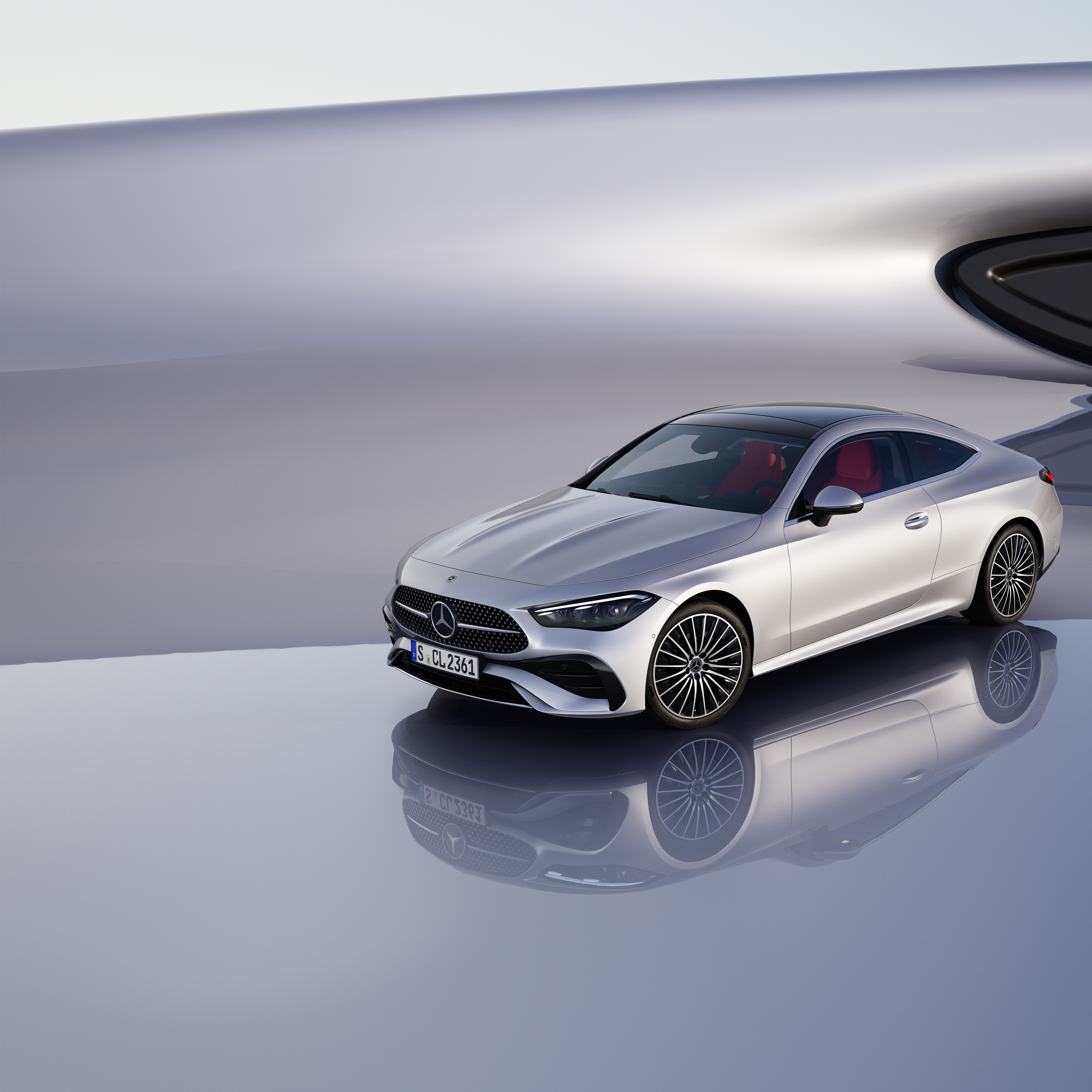 Coupés | Mercedes-Benz The front view of the Mercedes-Benz CLE Coupé in a bright surrounding.