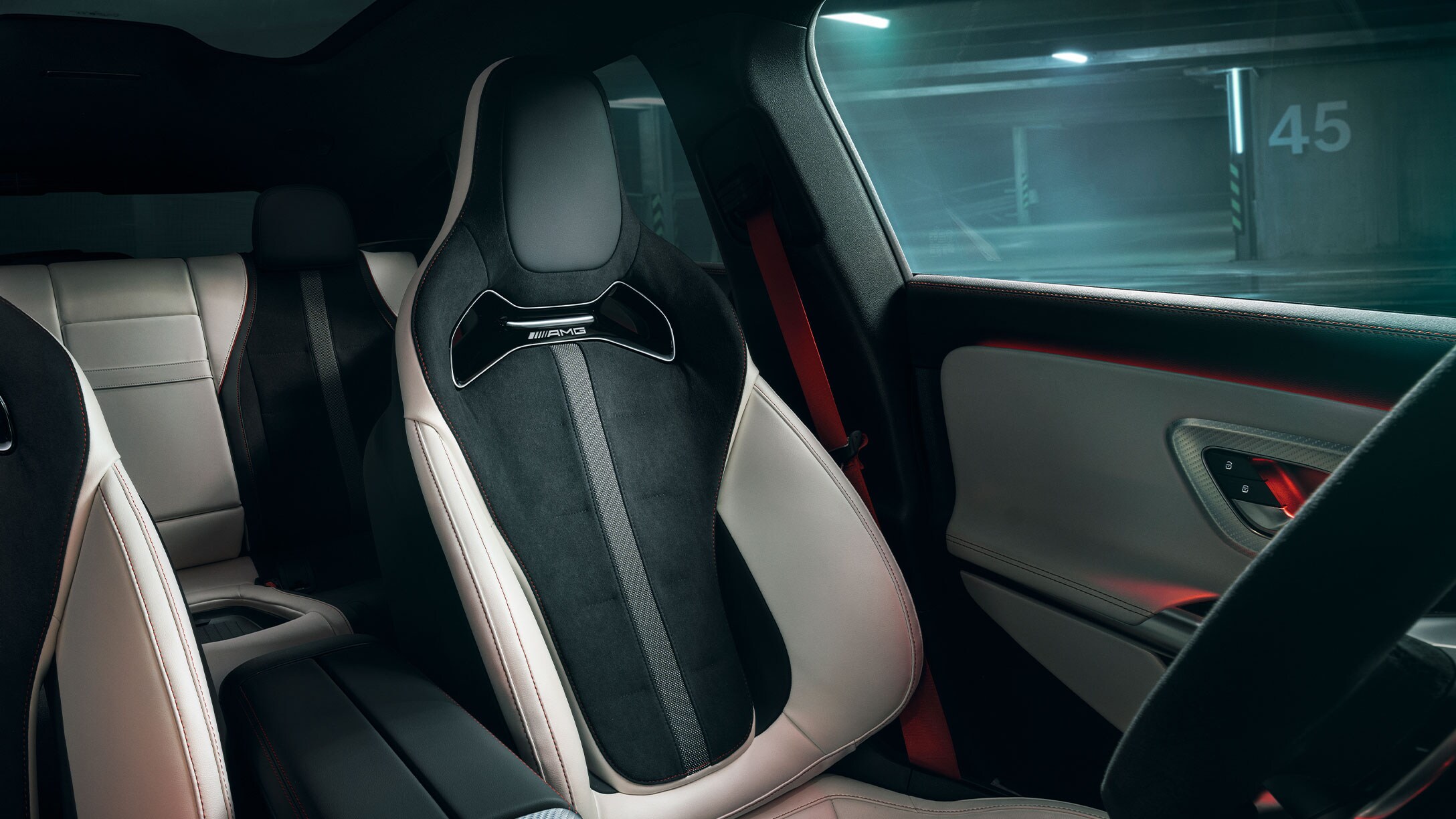 The all-new Mercedes-AMG CLA 45 4MATIC+ electric with red seat belts.