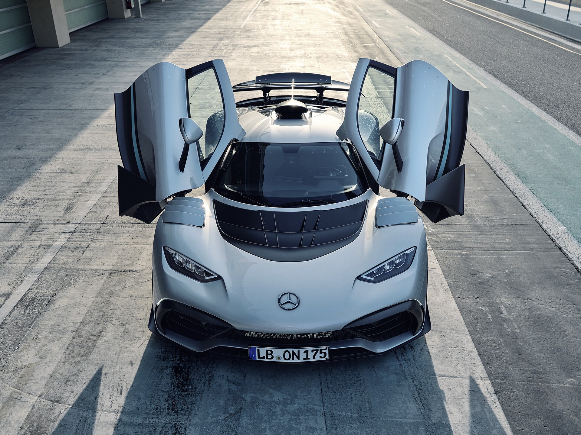 Front view of the Mercedes-AMG ONE with the doors open.