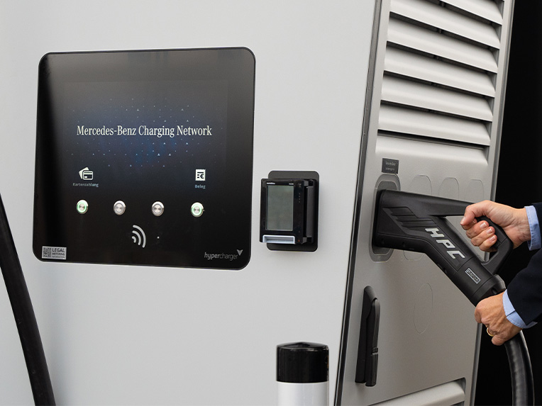 Charging options | Electromobility | Mercedes-Benz A Mercedes-Benz Charging Network station in use. Electromobility by Mercedes-Benz.