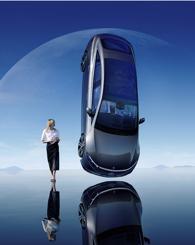 Integrated Service Package | Mercedes-Benz A woman stands right beside a hovering Mercedes-Benz car.