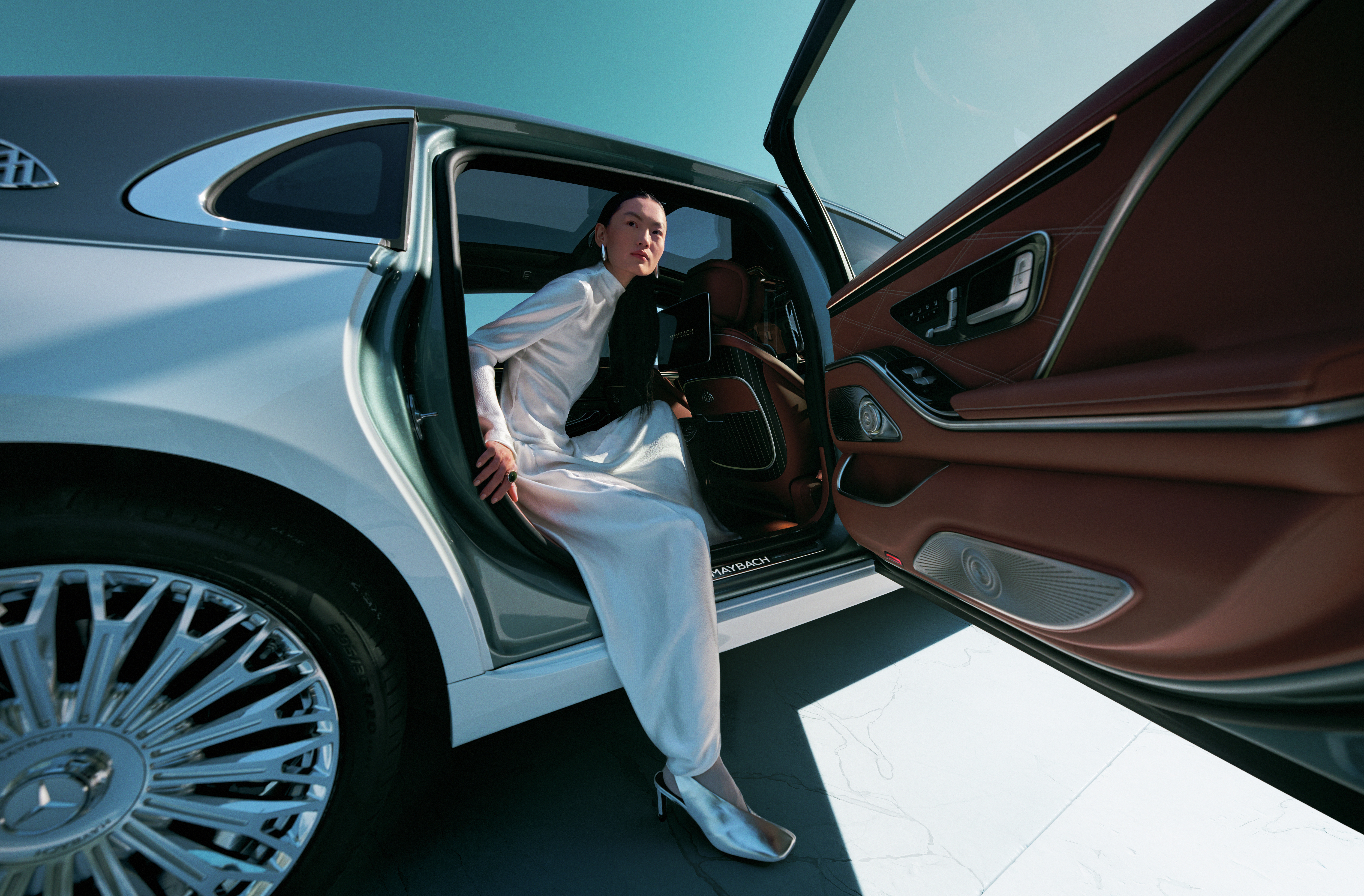 Mercedes-Benz FashionWeek Kuala Lumpur 2026 Image of a woman with blue face paint and a blue stylized background featuring the Mercedes-Benz FashionWeek Kuala Lumpur logo