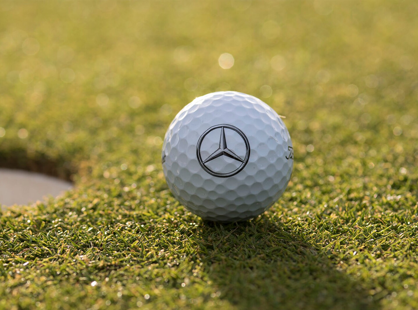 Mercedes ball on a golf course 