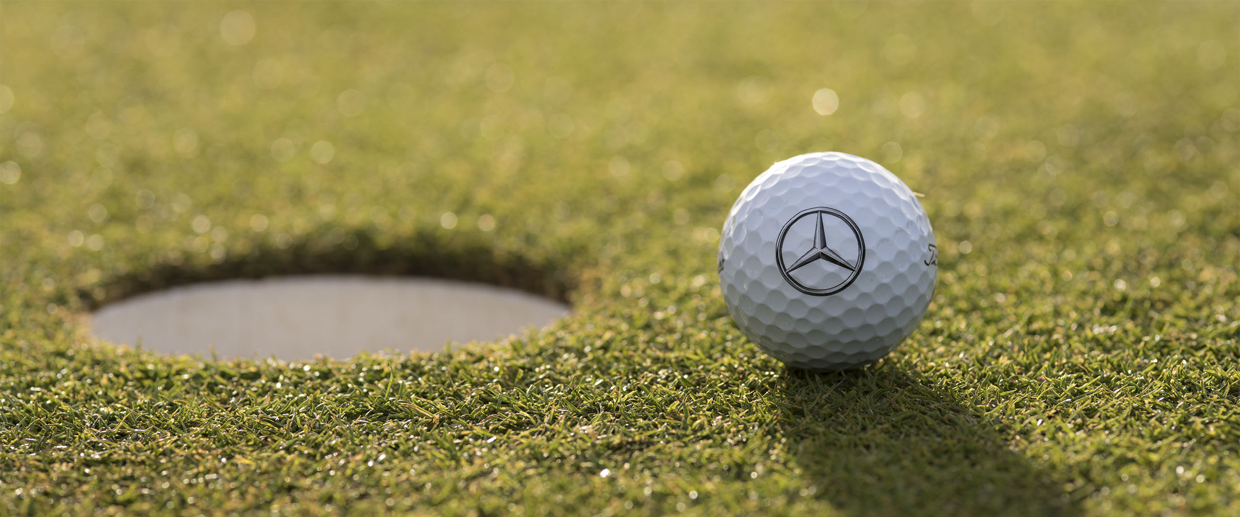 Mercedes ball on a golf course Mercedes ball on a golf course