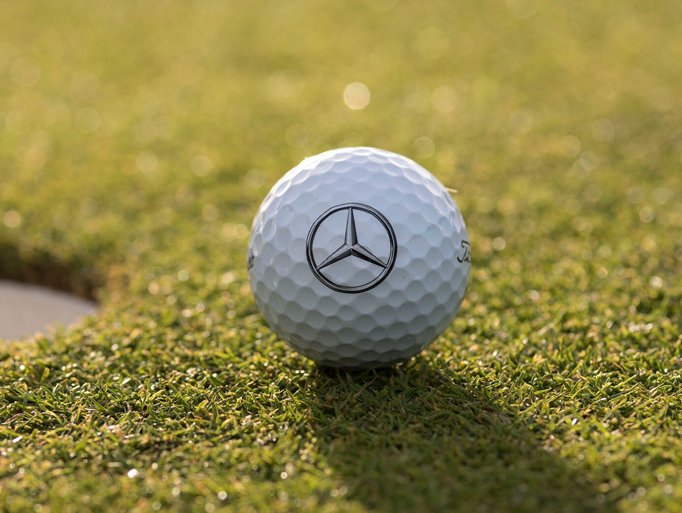 Mercedes ball on a golf course 