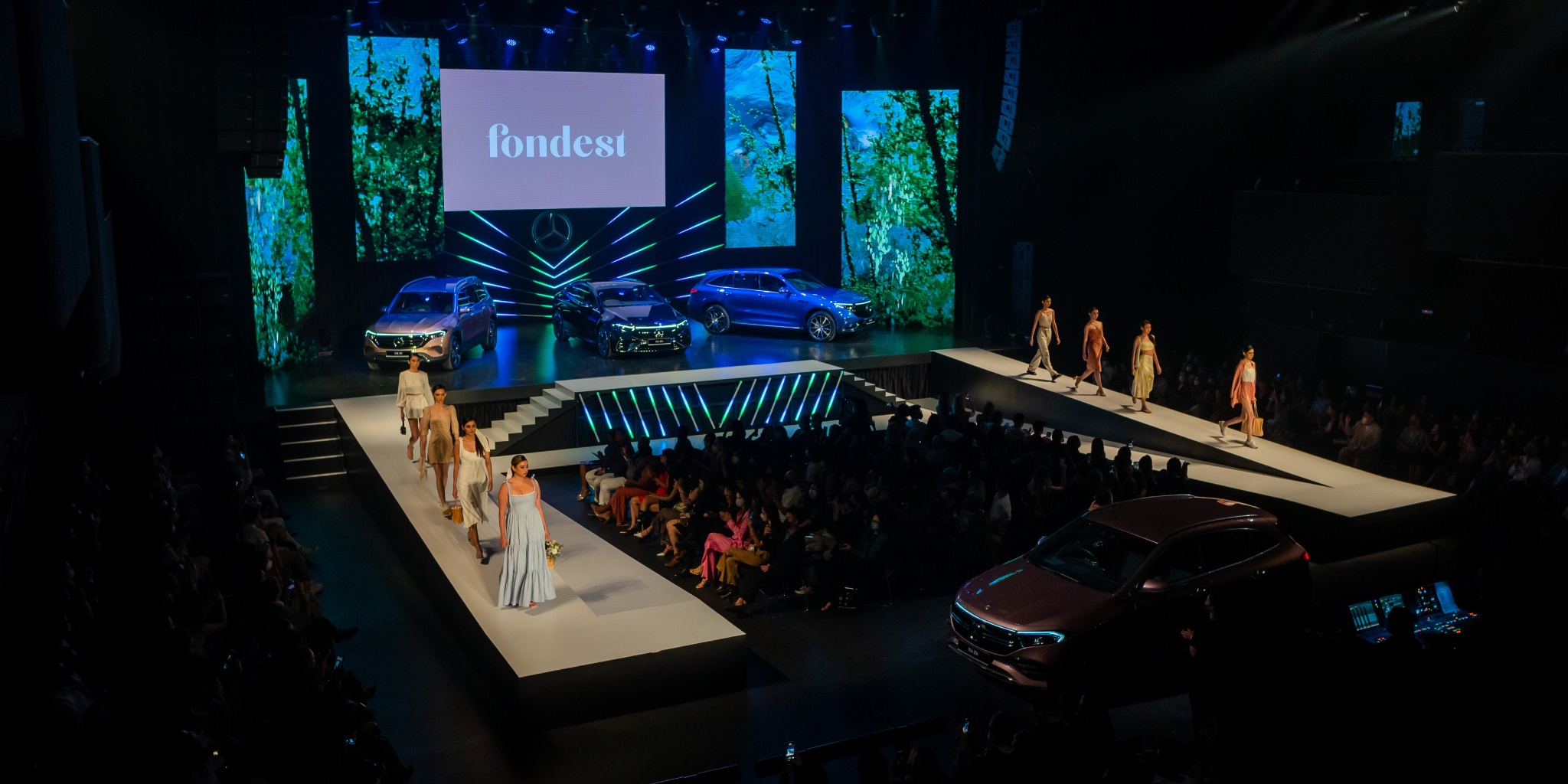 MBFWKL 2022 - News & Events Article The catwalk at Mercedes-Benz Fashion Week Kuala Lumpur featuring the EQB, EQS and EQC