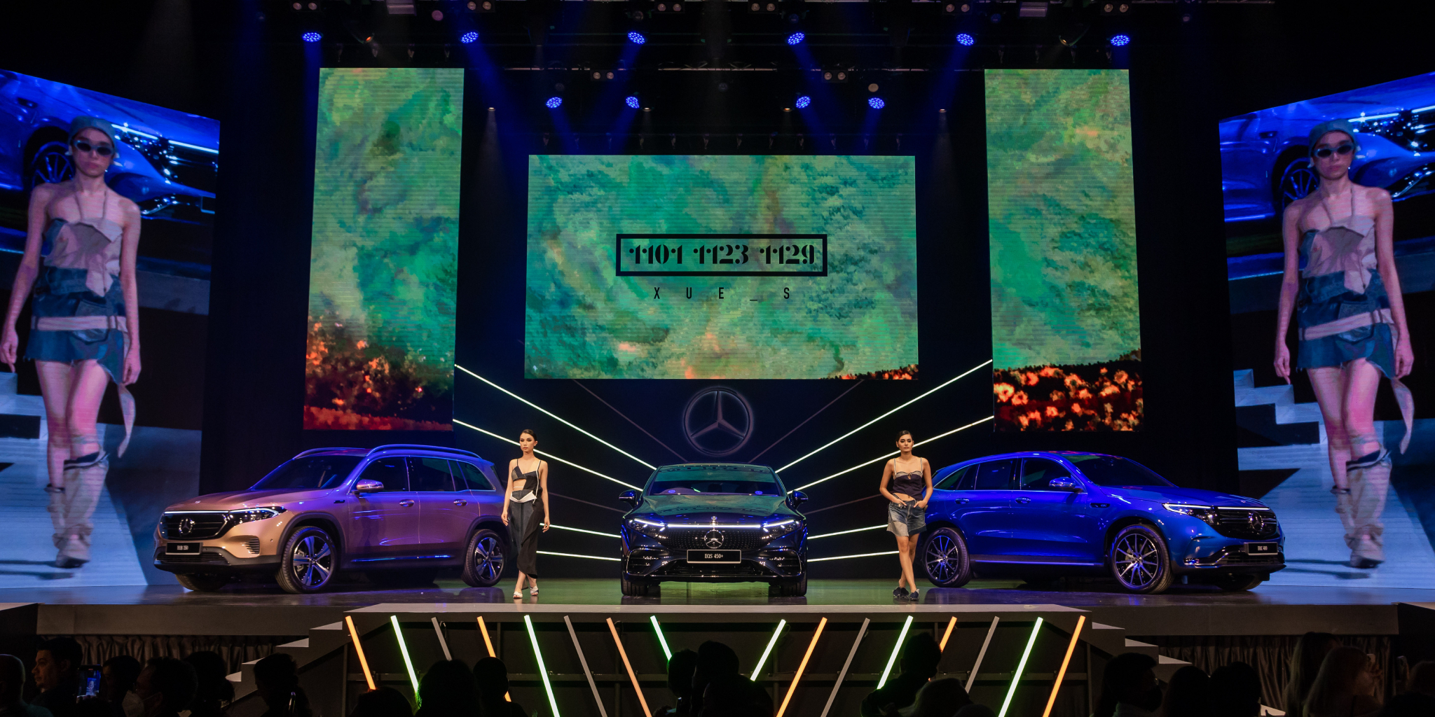 MBFWKL 2022 - News & Events Article Two models on stage at Mercedes-Benz Fashion Week Kuala Lumpur featuring the EQB, EQS and EQC