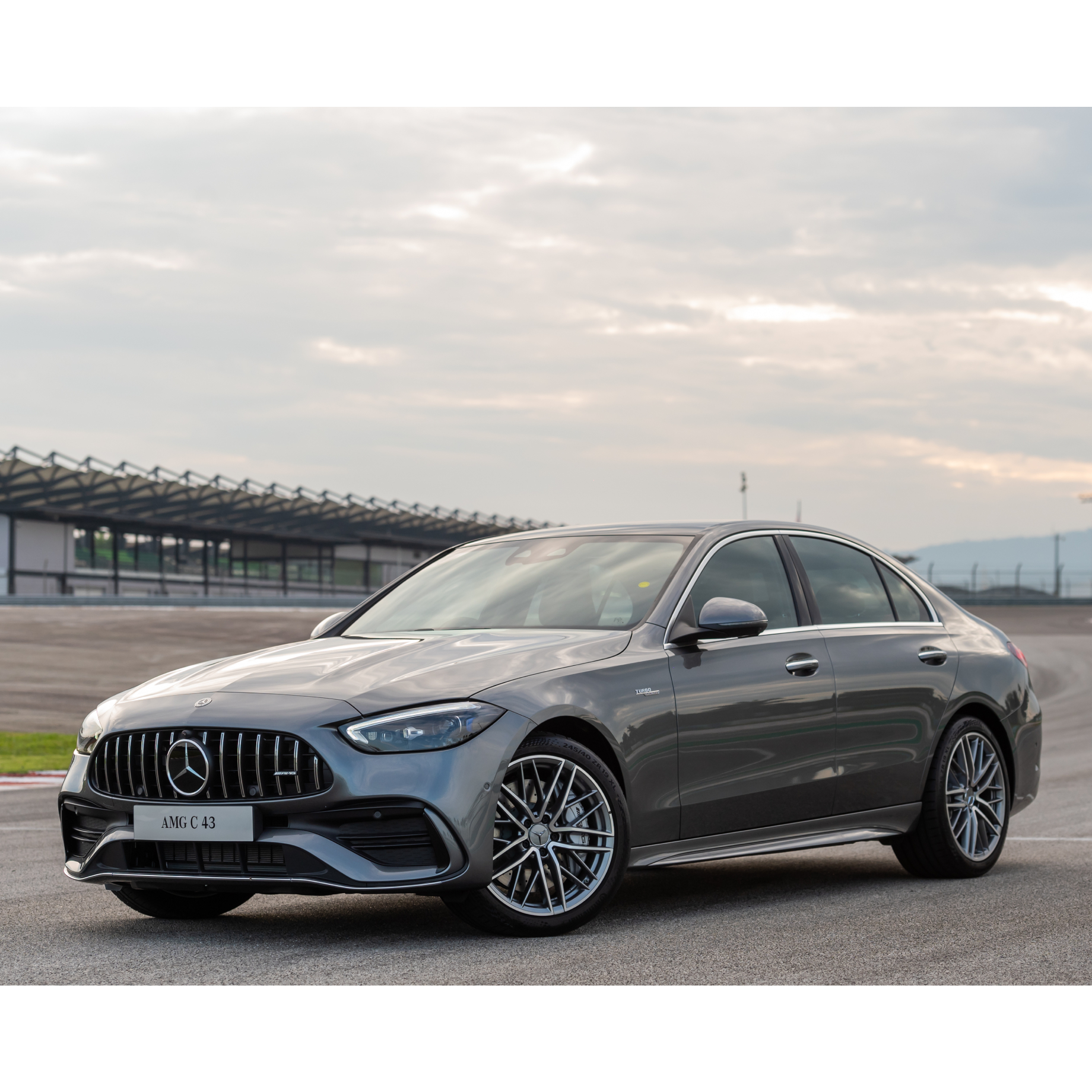 Mercedes-AMG C 43 4MATIC - New Mercedes-AMG Compacts Front side image of the Mercedes-AMG C 43 4MATIC on a race track