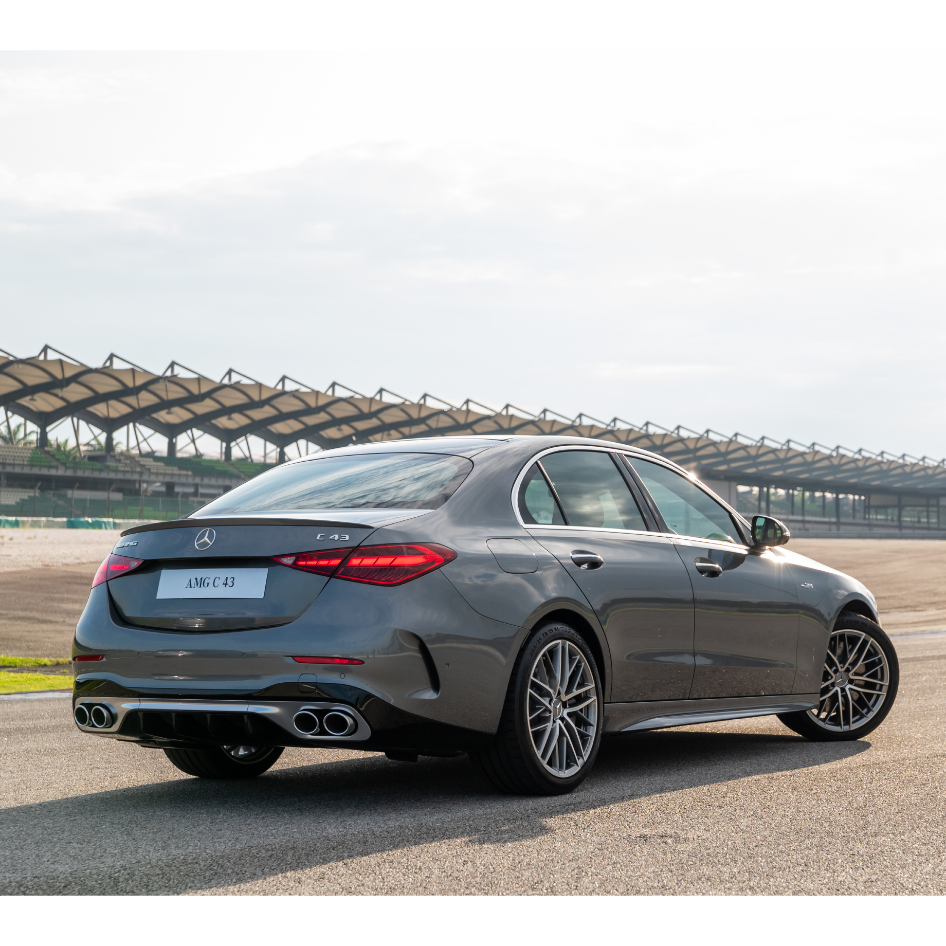 Mercedes-AMG C 43 4MATIC - New Mercedes-AMG Compacts Rear side image of the Mercedes-AMG C 43 4MATIC on a race track